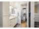 Bathroom featuring a glass-enclosed shower, white cabinets, and neutral tones at 42211 N Long Cove Way, Anthem, AZ 85086