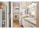 Well-lit bathroom with a separate shower, vanity with a sink, and tasteful decor at 42211 N Long Cove Way, Anthem, AZ 85086