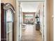 Inviting hallway leads to a living space with elegant furniture and natural light at 42211 N Long Cove Way, Anthem, AZ 85086