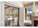 Seamless indoor/outdoor living with access to a covered patio, outdoor fireplace, and landscaped backyard at 42211 N Long Cove Way, Anthem, AZ 85086