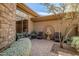 Outdoor patio featuring comfortable seating around a decorative fountain at 42211 N Long Cove Way, Anthem, AZ 85086