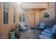 Inviting courtyard patio area with comfortable seating, potted plants, and shade for relaxing at 6202 E Mckellips Rd # 171, Mesa, AZ 85215