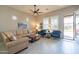Comfortable living room showcasing bright natural light, tile floors, and stylish furnishings at 6202 E Mckellips Rd # 171, Mesa, AZ 85215