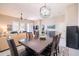 Open-concept living area featuring stylish furnishings, neutral colors, and large windows at 6202 E Mckellips Rd # 171, Mesa, AZ 85215