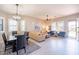 Open-concept living space with stylish furniture, neutral colors, and plenty of natural light at 6202 E Mckellips Rd # 171, Mesa, AZ 85215