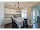 Cozy dining area adjacent to a kitchen featuring modern finishes at 6414 W Monterey Pl, Chandler, AZ 85226