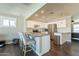 Open-concept kitchen boasts granite countertops and a breakfast bar at 6414 W Monterey Pl, Chandler, AZ 85226