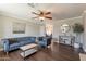 Cozy living room with dark wood floors and stylish furnishings at 6414 W Monterey Pl, Chandler, AZ 85226