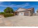 Charming single-Gathering home featuring a two-car garage, manicured landscaping and solar panels at 6456 E Orion St, Mesa, AZ 85215