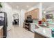Bright kitchen with stainless steel appliances and a view into an adjacent room at 6456 E Orion St, Mesa, AZ 85215