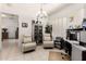 Bright home office featuring tile floors, shutters and ample workspace at 6456 E Orion St, Mesa, AZ 85215