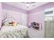 Charming bedroom with playful decor and a comfortable bed at 6513 W Latona Rd, Laveen, AZ 85339