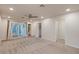 Large primary bedroom with neutral carpet, recessed lighting, ceiling fan, and access to the ensuite bath at 7226 E Virginia Ave, Scottsdale, AZ 85257