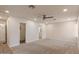 This bedroom is large, with neutral carpet, ceiling fan, window, and recessed lighting at 7226 E Virginia Ave, Scottsdale, AZ 85257