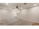 This bedroom is large, with neutral carpet, ceiling fan, window, and recessed lighting at 7226 E Virginia Ave, Scottsdale, AZ 85257