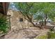 Charming courtyard space with brick accents and mature trees providing ample shade at 7226 E Virginia Ave, Scottsdale, AZ 85257