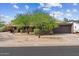 Charming single-story home with a two-car garage and mature trees in the front yard at 7226 E Virginia Ave, Scottsdale, AZ 85257