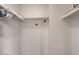 The walk-in closet has built-in shelving for storage and organization at 7226 E Virginia Ave, Scottsdale, AZ 85257