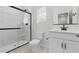 Modern bathroom featuring a glass enclosed shower, new toilet, and a white vanity at 7446 S 75Th Dr, Laveen, AZ 85339