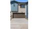 View of a two-story home with a brown garage door and driveway at 7446 S 75Th Dr, Laveen, AZ 85339