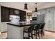 Gourmet kitchen with a center island, stainless steel appliances, and sleek cabinetry at 8541 N Farview Dr, Scottsdale, AZ 85258