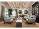 Spacious living area with hardwood floors, ample seating, and bright natural light at 8541 N Farview Dr, Scottsdale, AZ 85258