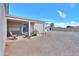 Expansive backyard featuring a covered patio area and ample space for outdoor activities and entertainment at 918 E Lincolnwood Cir, Casa Grande, AZ 85194