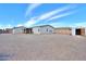 Expansive backyard with both covered patio and shed, perfect for outdoor living and storage solutions at 918 E Lincolnwood Cir, Casa Grande, AZ 85194