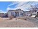 Charming single-story home with a well-maintained xeriscaped front yard and inviting entryway at 918 E Lincolnwood Cir, Casa Grande, AZ 85194