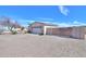 Spacious driveway with a two-car garage and fenced parking area, offering secure and ample parking at 918 E Lincolnwood Cir, Casa Grande, AZ 85194