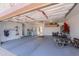 Clean and organized two-car garage with ample storage space, laundry and access to the backyard at 918 E Lincolnwood Cir, Casa Grande, AZ 85194
