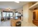 Bright kitchen with an island and adjacent dining area featuring natural light at 918 E Lincolnwood Cir, Casa Grande, AZ 85194