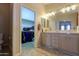 The main bathroom boasts a walk-in closet and double sink vanity at 918 E Lincolnwood Cir, Casa Grande, AZ 85194