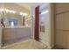 The main bathroom features a double sink vanity and walk-in shower at 918 E Lincolnwood Cir, Casa Grande, AZ 85194