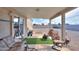 Covered patio featuring comfortable seating and a view of the backyard at 918 E Lincolnwood Cir, Casa Grande, AZ 85194