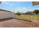 Backyard featuring a small wall and a lush green yard that provides extra privacy at 10408 N 105Th Ave, Sun City, AZ 85351