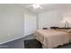 This bedroom is a cozy retreat featuring carpet, ceiling fan, and a spacious closet at 10408 N 105Th Ave, Sun City, AZ 85351