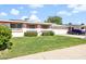 Welcoming home featuring a lush green lawn and convenient attached garage at 10408 N 105Th Ave, Sun City, AZ 85351