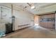 Attached garage with water filter and storage cabinets, providing ample parking and storage space at 10408 N 105Th Ave, Sun City, AZ 85351