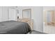 View of main bedroom with ensuite bathroom and closet at 10408 N 105Th Ave, Sun City, AZ 85351