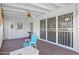 Enclosed patio featuring tiled flooring, ceiling fan and white metal security doors at 10408 N 105Th Ave, Sun City, AZ 85351