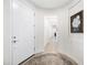 Bright entryway with neutral walls, stylish decor, and a welcoming ambiance at 10726 E Tallahassee Ave, Mesa, AZ 85212