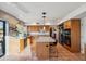 Bright and airy kitchen boasts an island, modern appliances, and an abundance of counter space at 10810 E San Salvador Dr, Scottsdale, AZ 85259