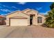 Charming single-story home featuring a two-car garage and well-maintained landscaping at 11406 W Piccadilly Rd, Avondale, AZ 85392