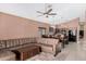 Cozy living room featuring a sectional sofa and access to the kitchen area at 11406 W Piccadilly Rd, Avondale, AZ 85392