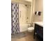 Full bathroom features a shower-tub combination and stylish vanity with modern fixtures at 12543 W Brandywine W Dr, Sun City West, AZ 85375
