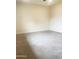 Spacious bedroom features neutral carpet, great natural light, and room for a large bed at 12543 W Brandywine W Dr, Sun City West, AZ 85375