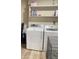 Functional laundry room equipped with modern washer and dryer, offering convenience and efficiency at 12543 W Brandywine W Dr, Sun City West, AZ 85375