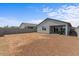 Wide angle view of expansive backyard, enclosed with block wall, and covered patio at 13171 W Buckskin Trl, Peoria, AZ 85383