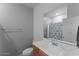 Clean bathroom featuring vanity with sink and a shower with a patterned shower curtain at 13171 W Buckskin Trl, Peoria, AZ 85383